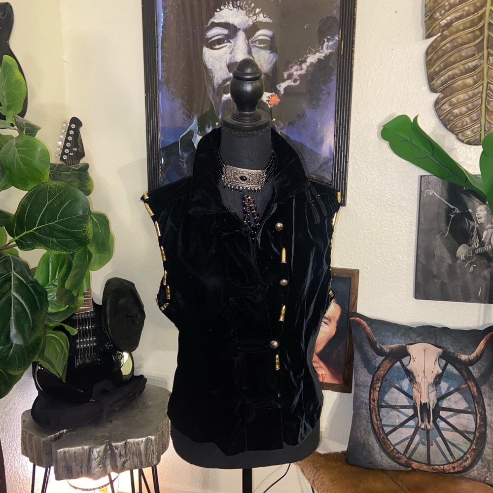 Upcycled black velvet vest. Gold and black embellishments. Conversation piece!
